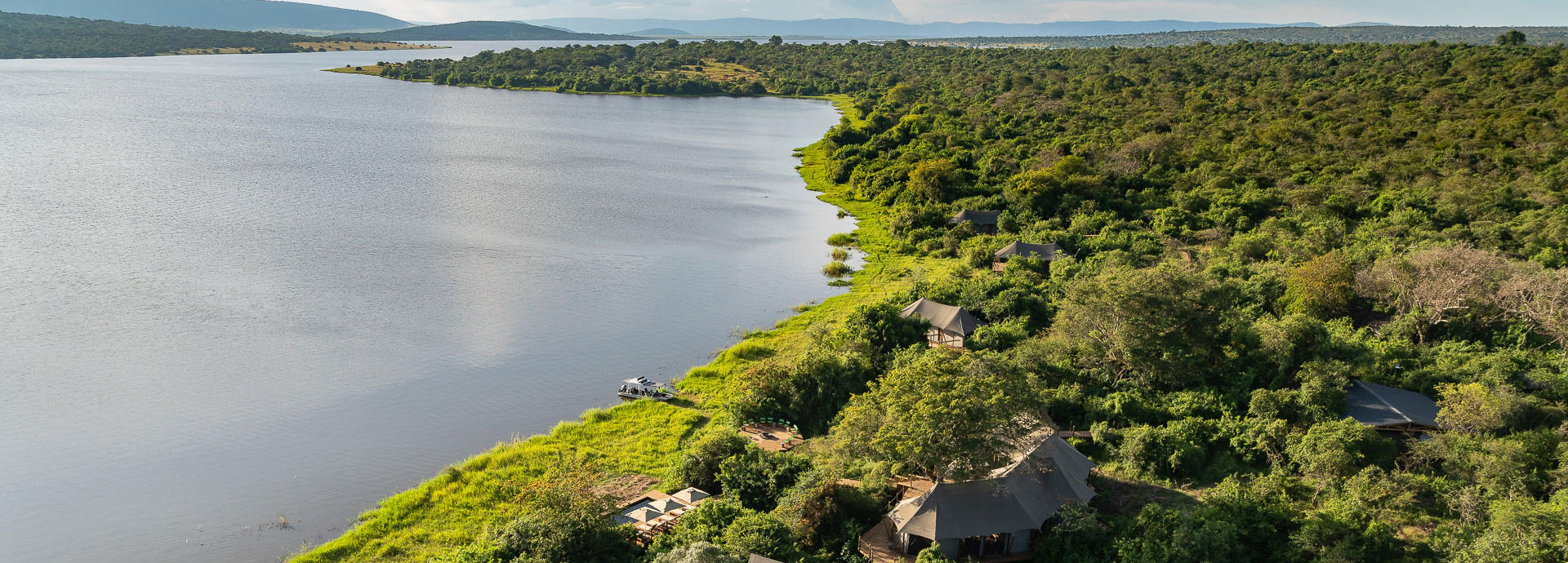 Aerial view of Magashi Camp at the shore of Lake Rwanyakazinga