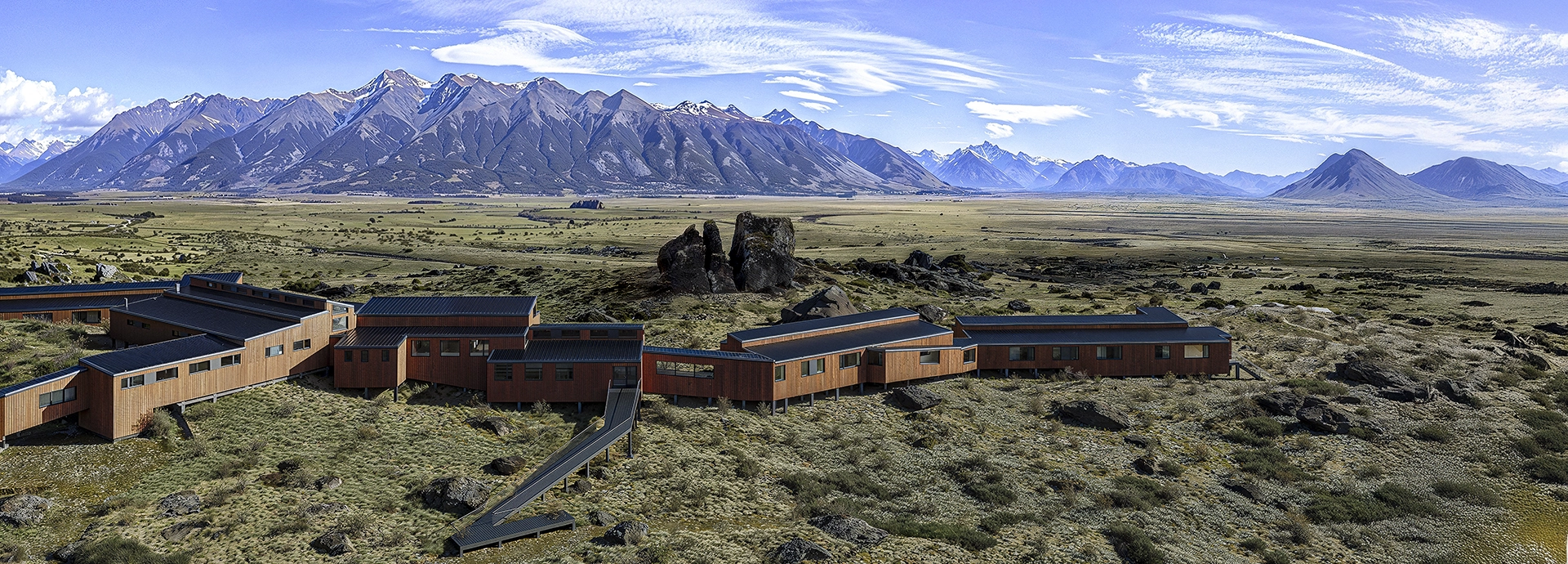 Explora El Calafate’s contemporary timber lodge sits against a dramatic backdrop of wide open steppe and snow-capped mountains.
