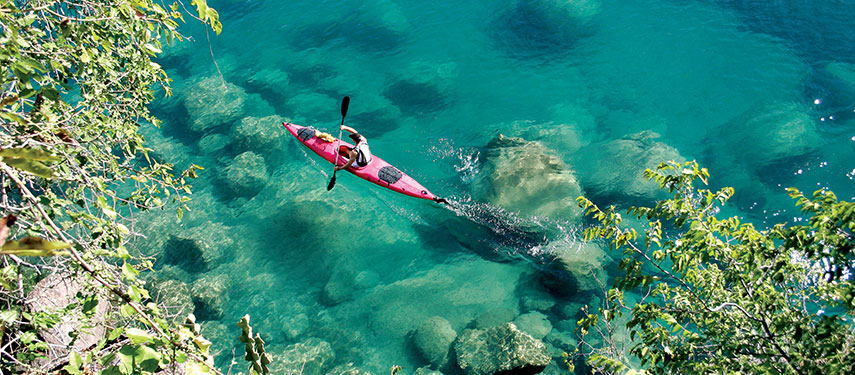 Kayak on crystal clear waters in Malawi