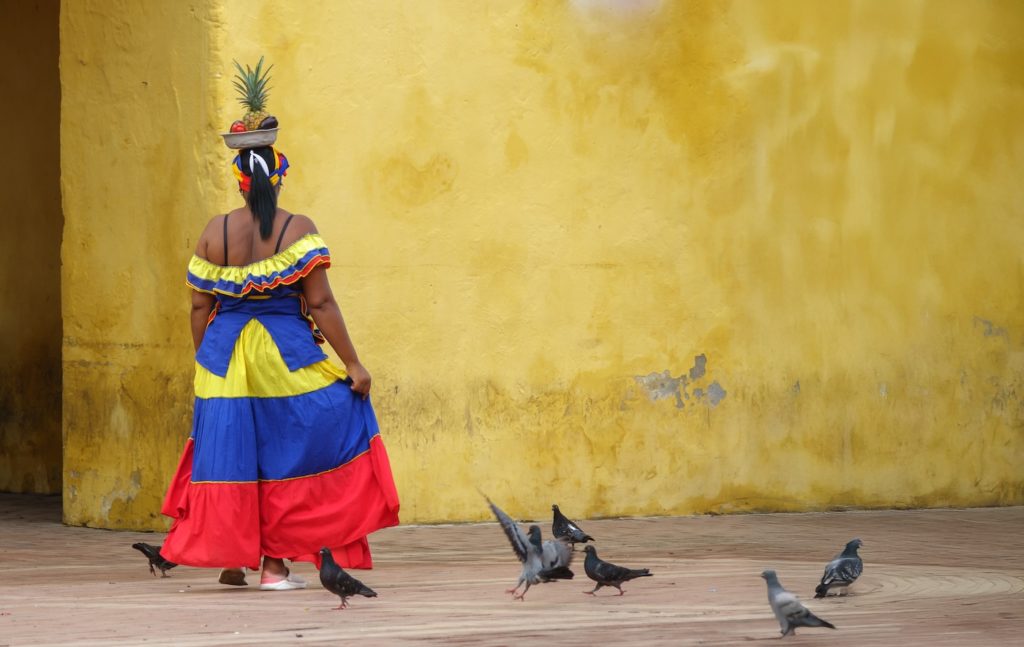 Traditional Colorful Fruit Street Vendors In Cartagena De Indias Called Palenqueras