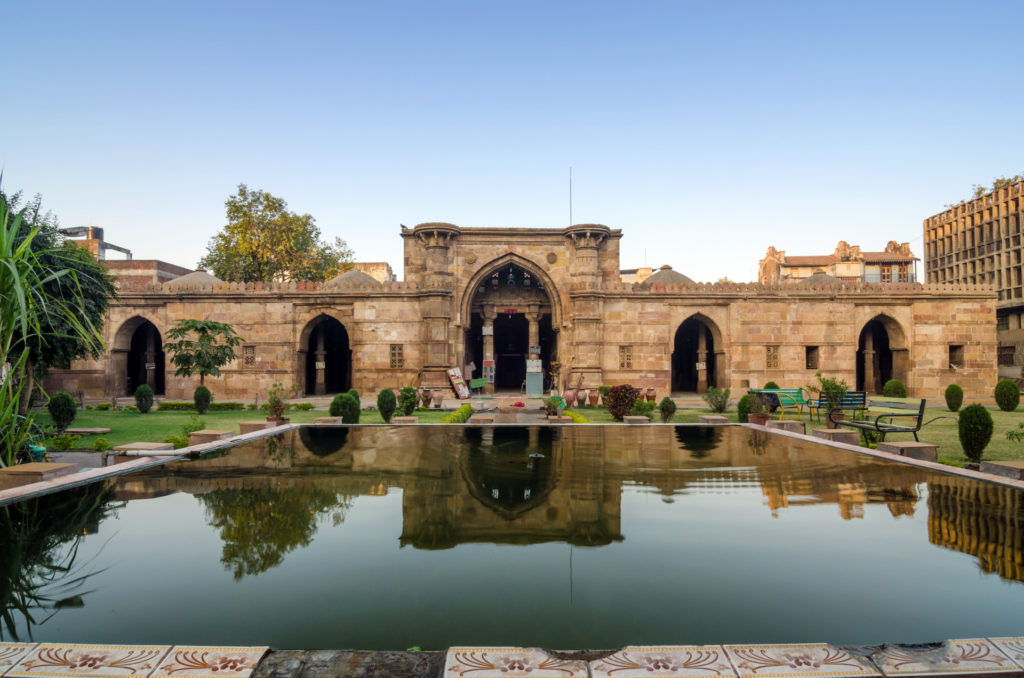 Sandstone mosque courtyard with a reflecting pool, near Sidi Sayed Mosque, Ahmedabad