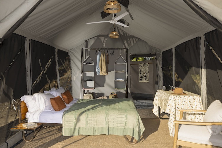 Meru-style safari tent at Kweene Trails Camp on the banks of the southwest Okavango Delta, Botswana 