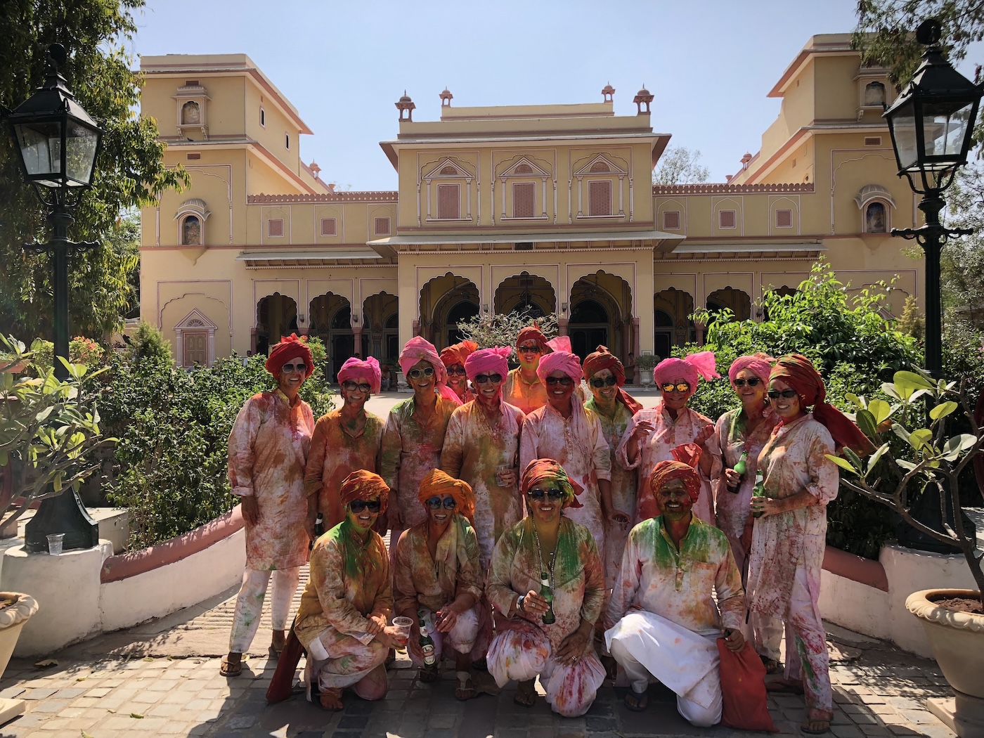 Western women celebrating the colourful festival of Holi on a luxury safari in India