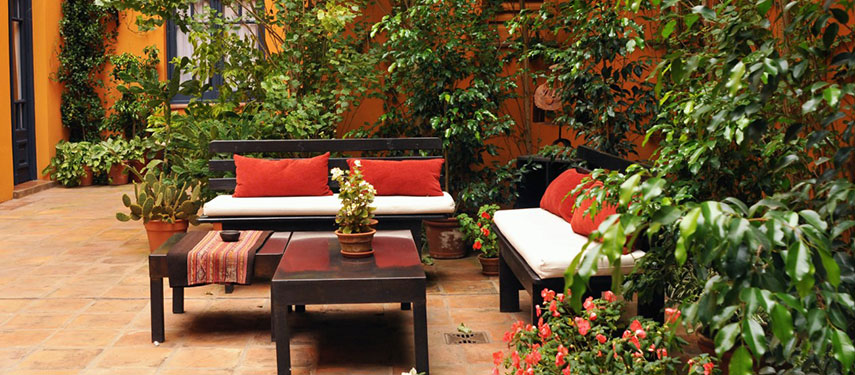 Enjoy the courtyard with a gin & tonic in hand at Legado Mitico Salta