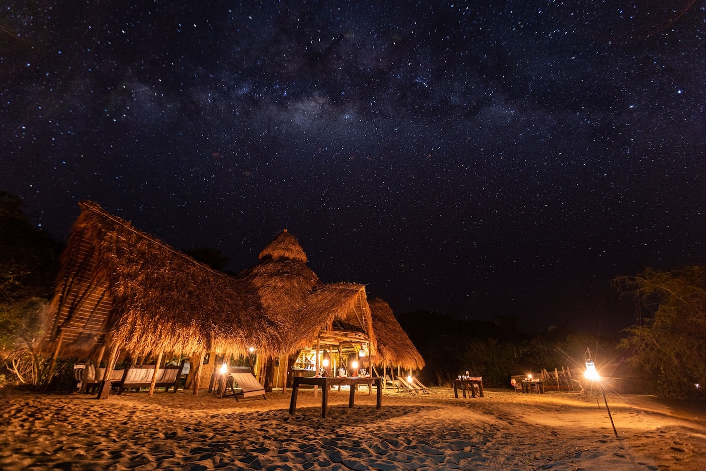 Greystoke Mahale main lodge by night, on the banks of Lake Tanganyika - the Lake of Stars - Tanzania